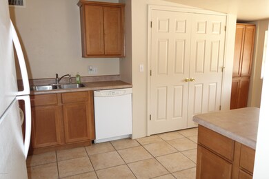UPDATED KITCHEN WITH LAUNDRY CLOSET