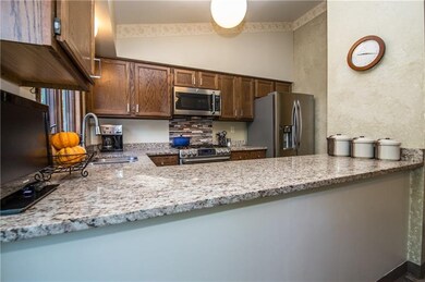 Eat-in Kitchen has new granite counters, and tile 