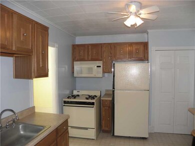 Kitchen. Full bath off to the left in photo w/ a t