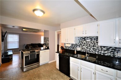 Welcome to this new kitchen! Completely updated from granite countertops, backsplash and ceramic tile floors!