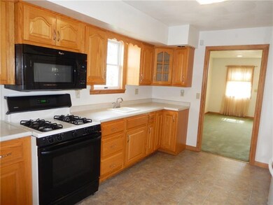 A beautiful kitchen with breakfast bar and generou