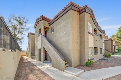 View of property with stairs