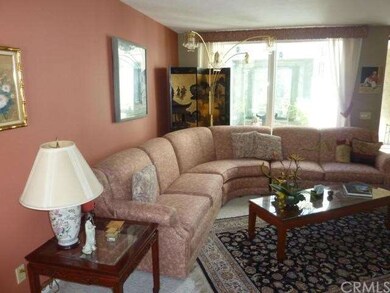 Beautiful living room with fireplace and bar. Brig