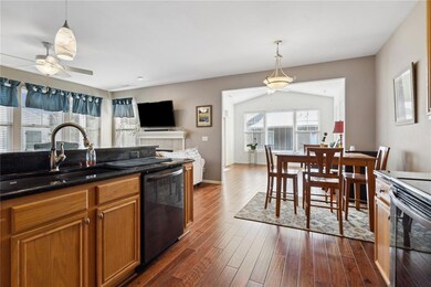Kitchen into dining area and sunroom