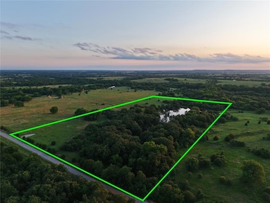Aerial view of sparsely populated area with property boundaries highlighted