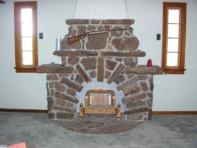 What a fireplace!  Gas line there - add your inser