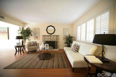 Gorgeous livingroom with plantation shutters and w