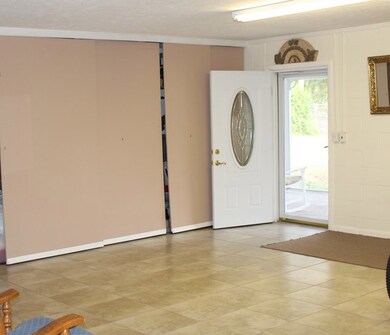Foyer or dining room with murphy bed