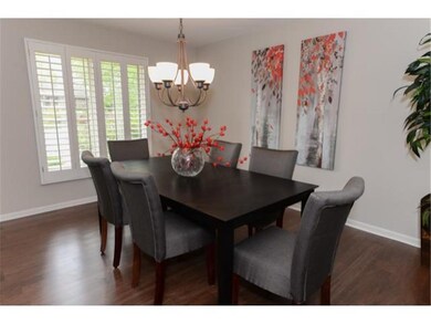 Elegant formal dining room is located off of the l