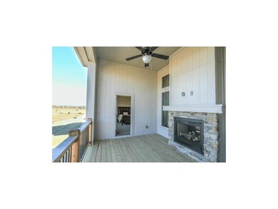 OUTDOOR FIREPLACE ON COVERED DECK