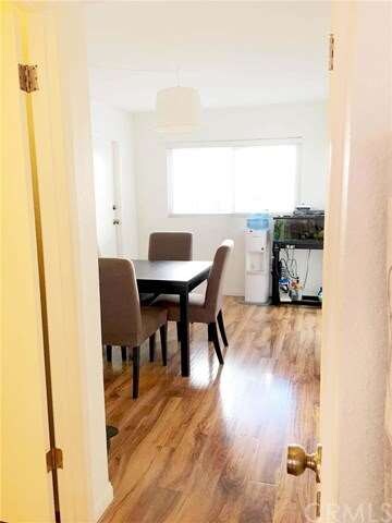 Dining Room Leads to the Garage on the left  and P