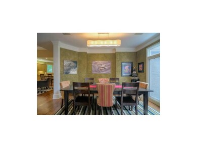 The formal dining room is perfect for family and f