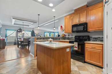 Kitchen featuring ceiling fan, light hardwood / wo