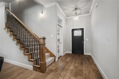 Foyer and stairs to 2nd floor