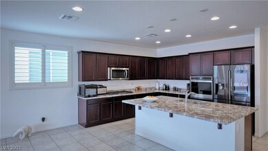 Kitchen with stainless steel appliances, smart fri