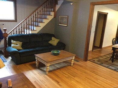 alt living room view towards upstairs