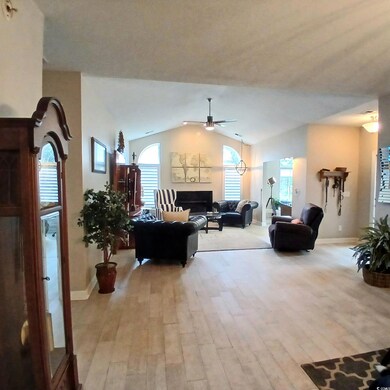 Living room with a wealth of natural light, ceilin
