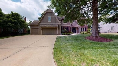 Nice curb appeal with shaded front yard and 3-car 