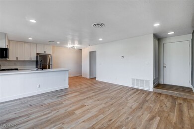 Kitchen featuring light wood finished floors, visi