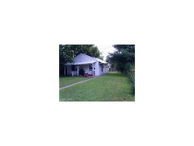 Single unit dwelling is located in the back yard.