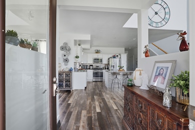 Entrance foyer with dark wood finished floors