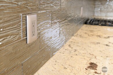 Brilliant backspash w/gorgeous granite