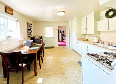 TRUE country kitchen with full size dining table capability.  Dual deep sinks and lots of natural light.