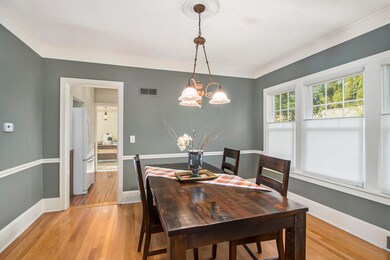 Dining room with view into kitchen
