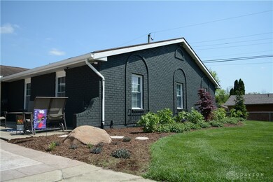 professionally landscaped with flowering shrubs, t