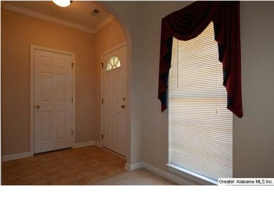 VIEW OF FOYER FROM THE LIVING AREA.