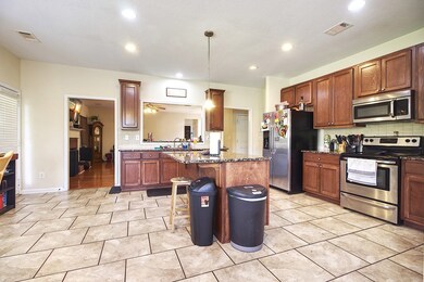 Kitchen Sink overlooks the Living Room