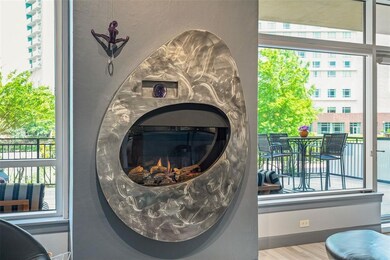 The custom fireplace surround is the focal point o