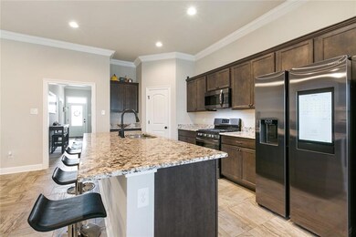 Well appointed Kitchen features granite counters,