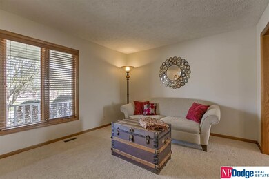 LIVING ROOM OPENS TO FORMAL DINING ROOM