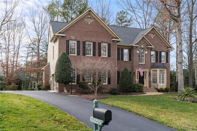 View of front of property with a front yard