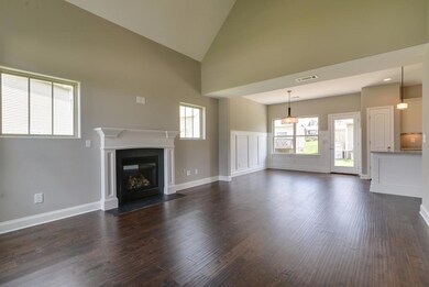 Fireplace and open Kitchen and dining to Great room