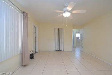 View of living area facing hallway to 3 bedrooms.