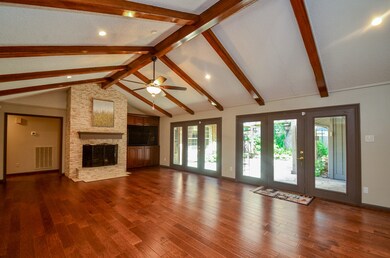 HUGE family room with doors to patio and open to k