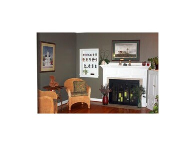 This inviting living room has a beautiful fire pla