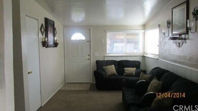 Living room photo taken from Dining area. Entry ha