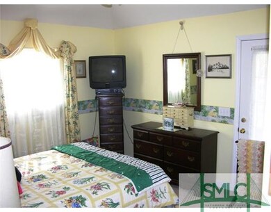 Exterior Front. SECOND BEDROOM WITH DOOR TO PORCH