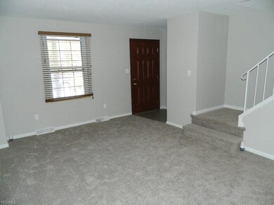 Living Room View - Newly Carpeted and Painted
