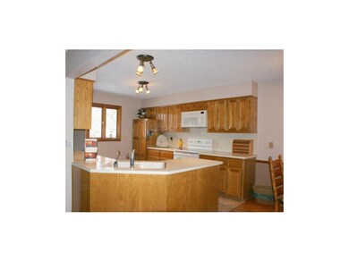 Open Kitchen with Tile Floor
