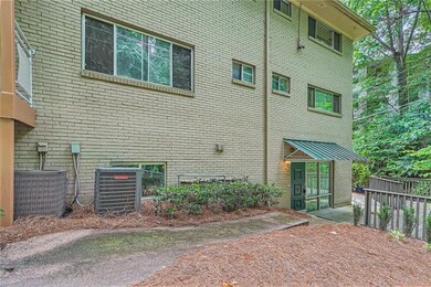View of side of property featuring central AC unit