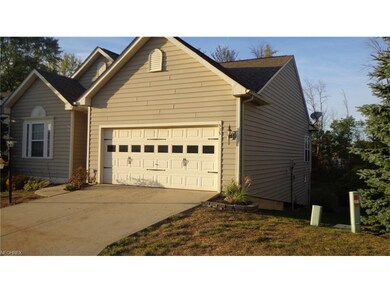 2 car garage has tall ceilings and depth