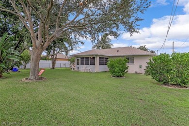Large fenced back yard with mature trees. Great for a dog!
