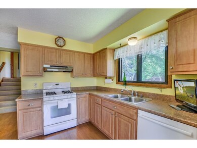 Open and bright kitchen with sliding glass doors l