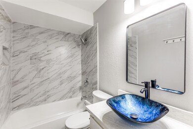 Full bathroom with bathtub / shower combination, 