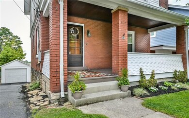 Nicely landscaped with brand new asphalt driveway.