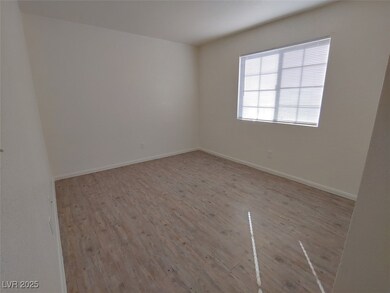 Unfurnished room with light wood-type flooring